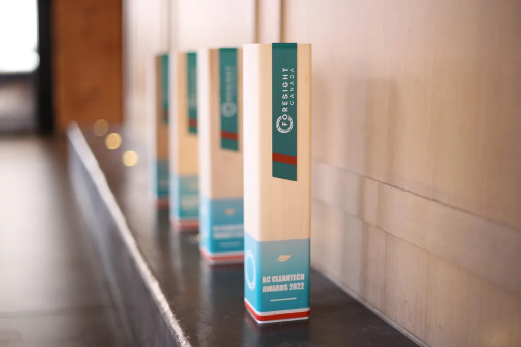 A row of four Foresight Canada BC Cleantech Awards 2022 trophies lined up along a ledge